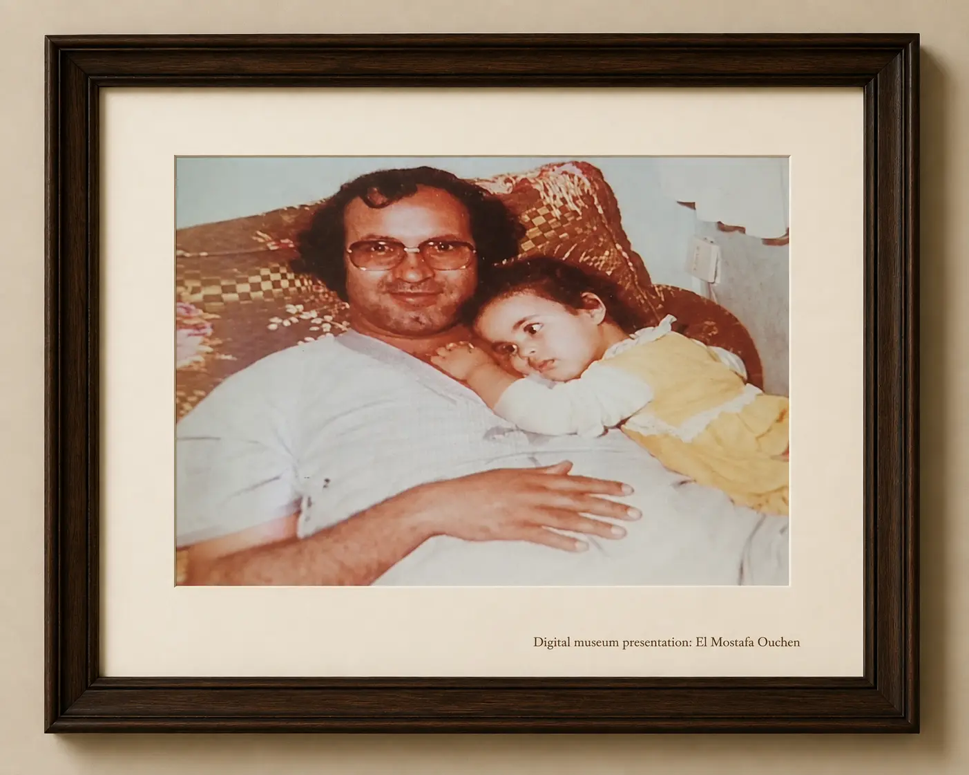 Omar Sayed holding an infant