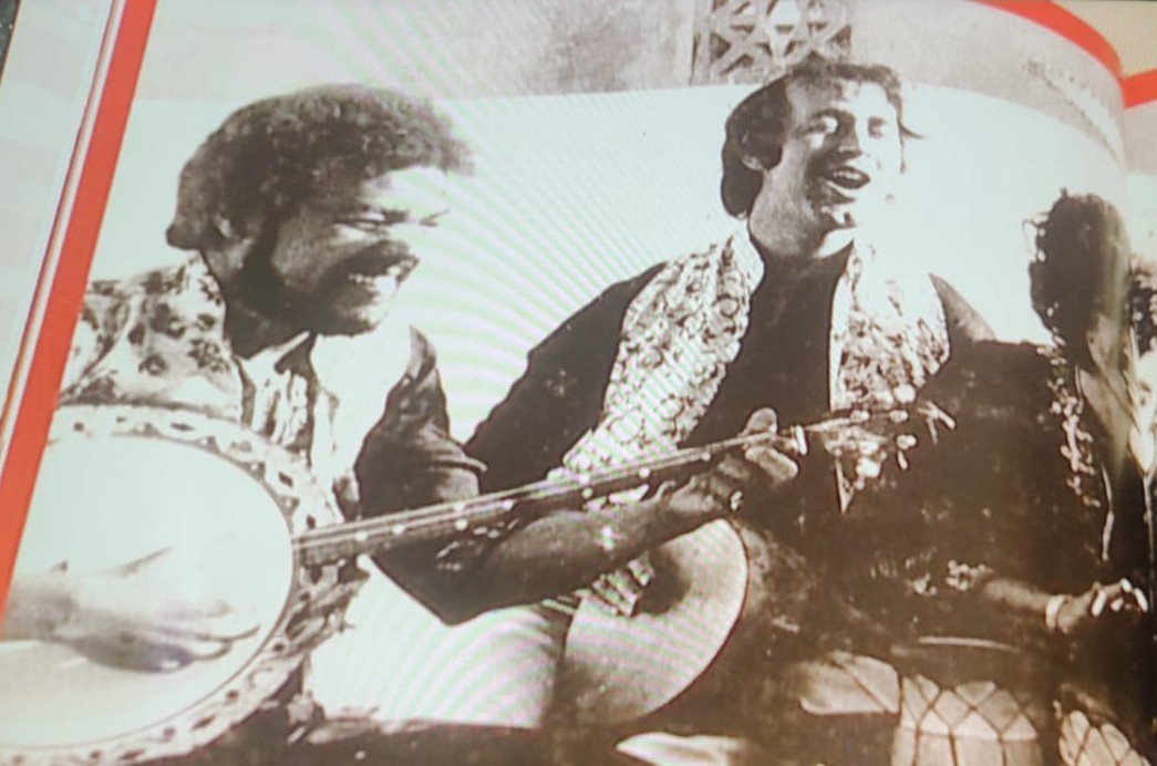A Nass El Ghiwane singer performing with banjo accompaniment, 1970s