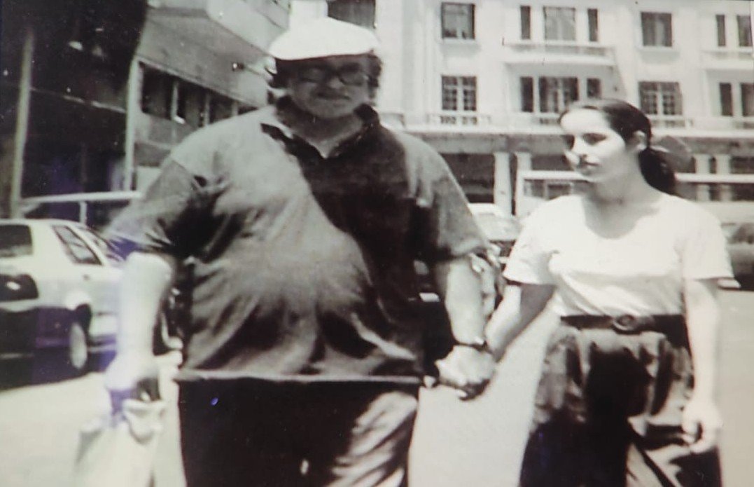 Omar Sayed walking with adult Siham in Casablanca