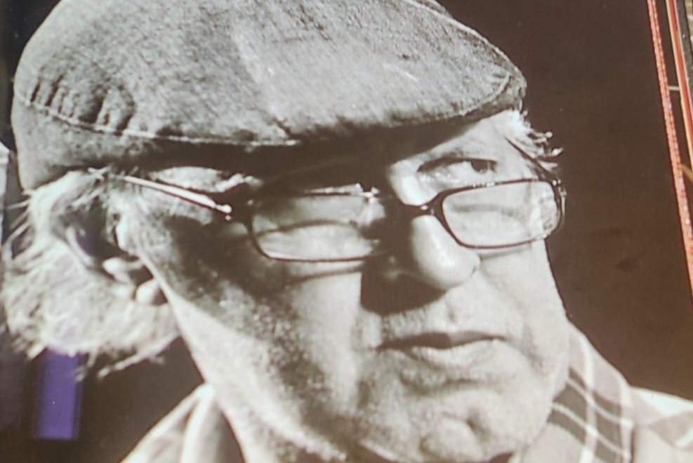 Close-up black and white portrait of Omar Sayed
